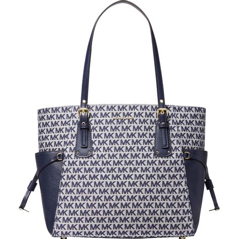 michael michael kors voyager logo large east west tote|michael kors voyager signature tote.